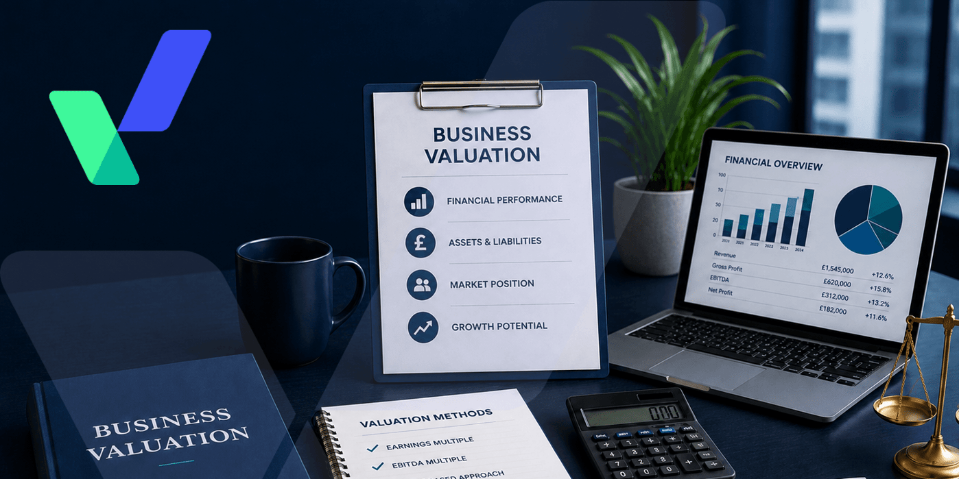Professional business valuation workspace featuring financial reports, valuation documents, calculator, laptop displaying analytics, and business planning materials on a modern blue-toned desk with subtle corporate branding elements and a blurred office background.